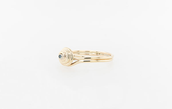 Gold Swirl Ring with Blue Diamond